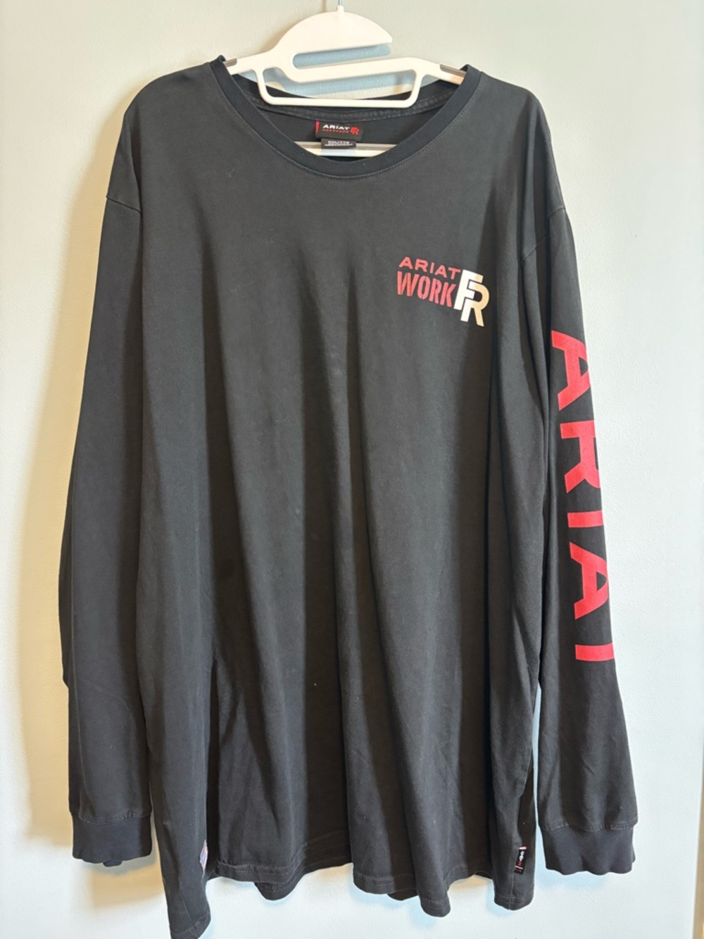 Ariat Black Men’s work FR Long Sleeve Tee with Red Sleeve Logo
